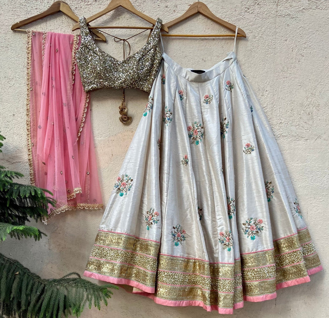 Ivory Raw Silk Lehenga With Floral Embroidery Priti Sahni - Fabilicious Fashion