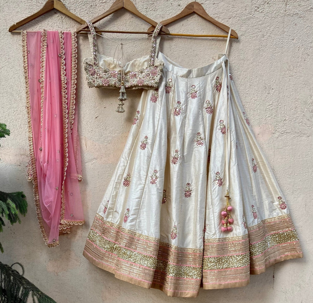 Ivory Raw Silk Lehenga With Mirror Work And Bustier Set Priti Sahni - Fabilicious Fashion