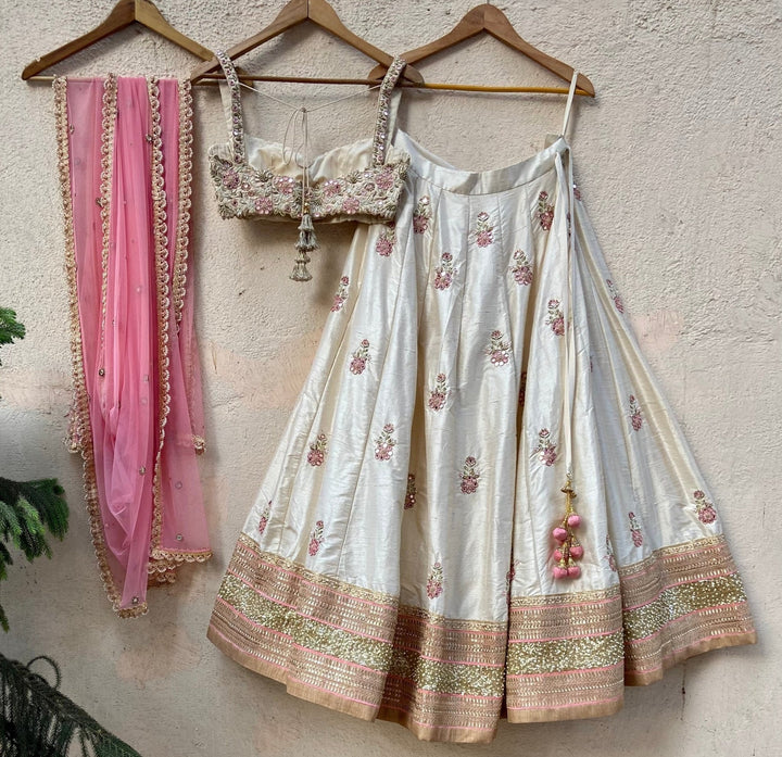 Ivory Raw Silk Lehenga With Mirror Work And Bustier Set Priti Sahni - Fabilicious Fashion
