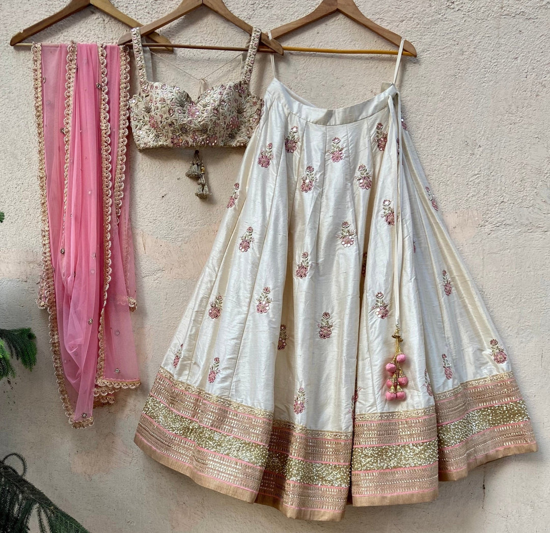 Ivory Raw Silk Lehenga With Mirror Work And Bustier Set Priti Sahni - Fabilicious Fashion