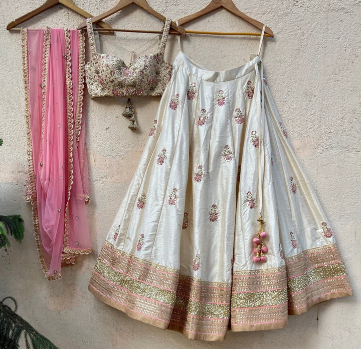 Ivory Raw Silk Lehenga With Mirror Work And Bustier Set Priti Sahni - Fabilicious Fashion