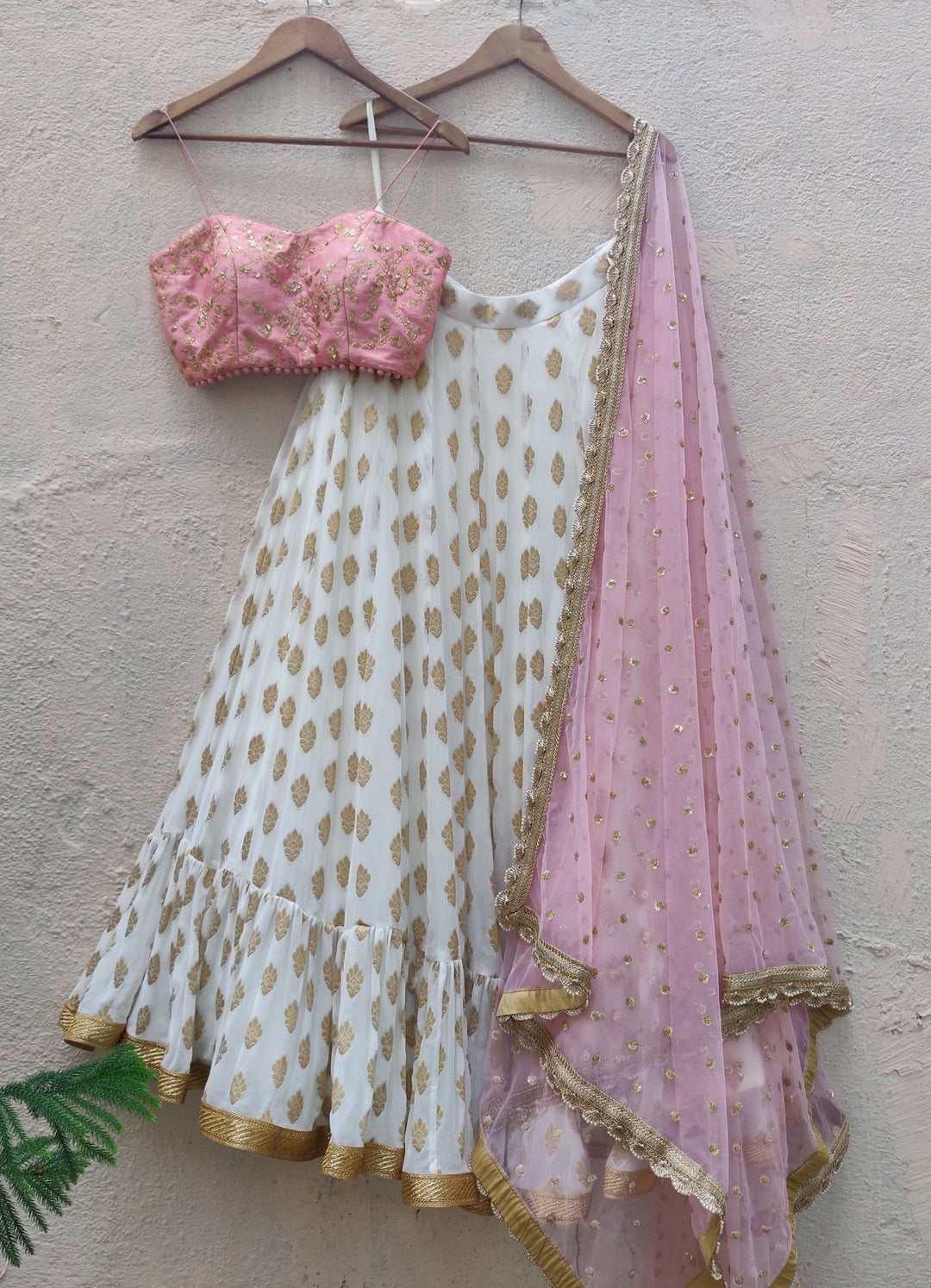 Ivory Ruffle Lehenga And Pink Bustier Set Priti Sahni - Fabilicious Fashion