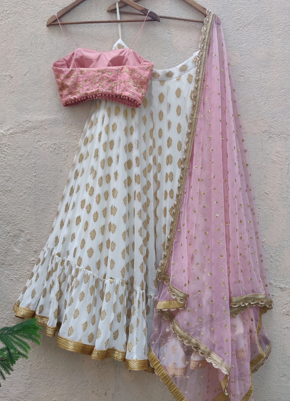 Ivory Ruffle Lehenga And Pink Bustier Set Priti Sahni - Fabilicious Fashion