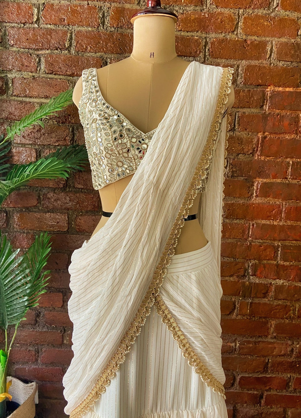 Ivory Ruffled Pre-Draped Saree With Sleeveless Blouse Priti Sahni - Fabilicious Fashion