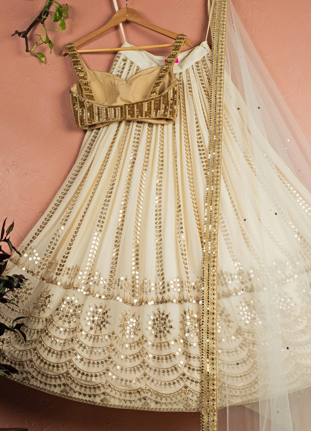 Ivory Sequined Georgette Lehenga Set With Gold Sequined Blouse Anisha Shetty - Fabilicious Fashion