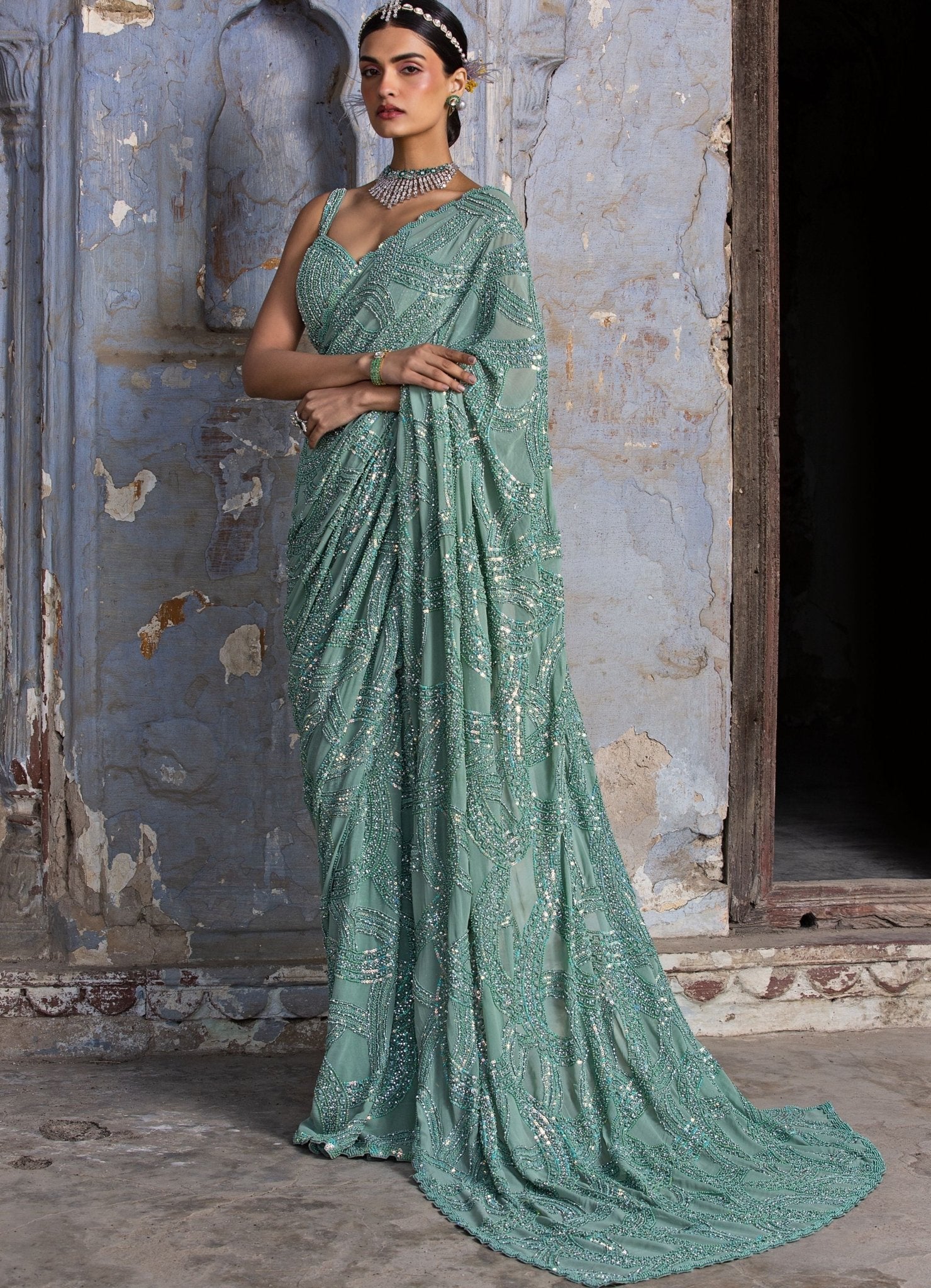 Jade green georgette embellished Nitika Gujral wedding guest saree set