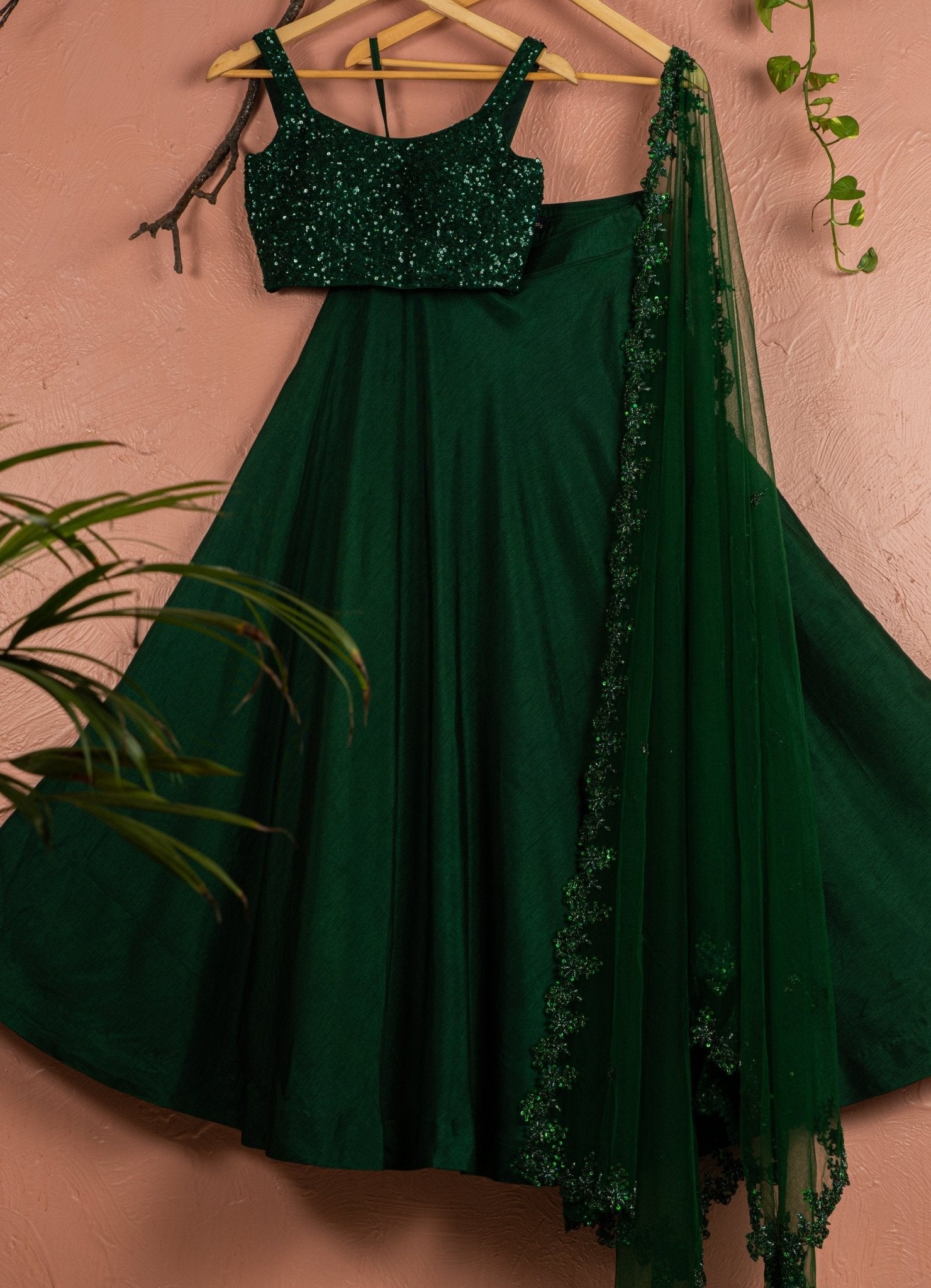 Jewelled green raw silk lehenga set by Anisha Shetty for mehendi