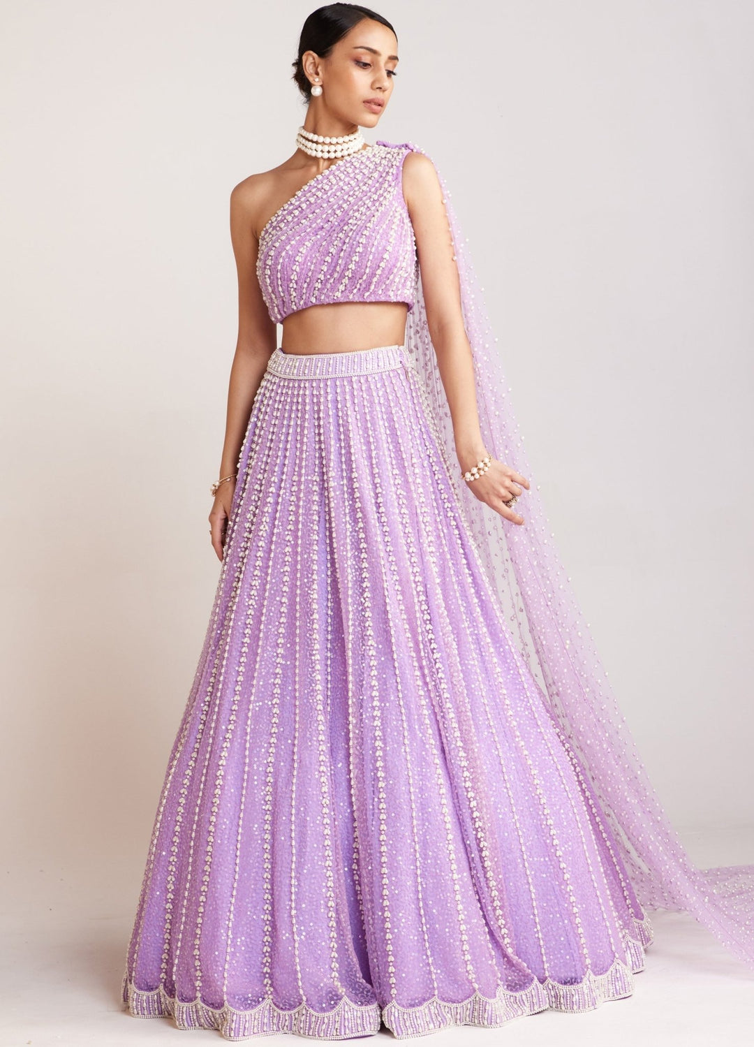 Lilac Net Lehenga With One Shoulder Blouse Set Vvani By Vani Vats - Fabilicious Fashion