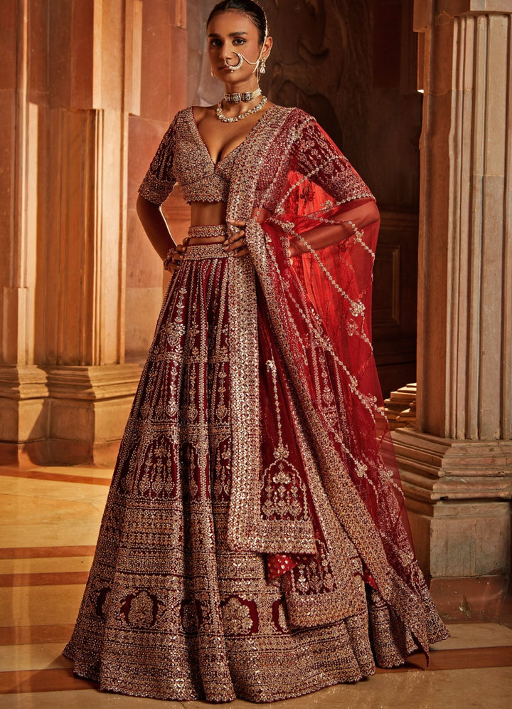Maroon Raw Silk Lehenga Set With Belt And Tulle Dupatta Nitika Gujral - Fabilicious Fashion