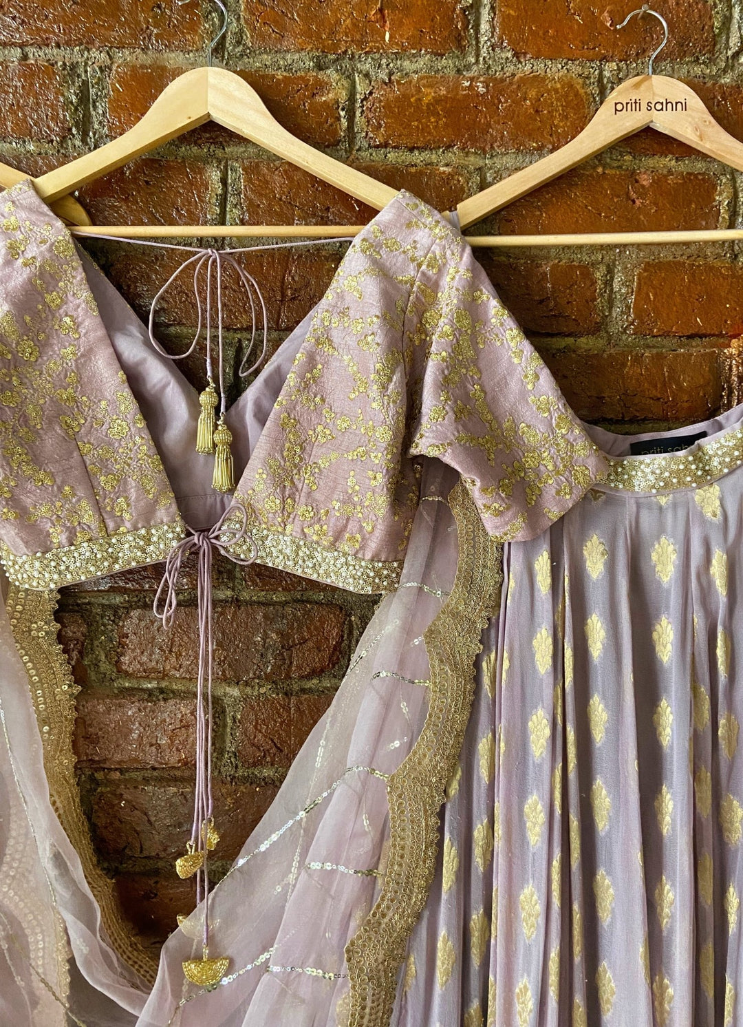 Mauve Ruffle Lehenga Set With V-neck Blouse Priti Sahni - Fabilicious Fashion