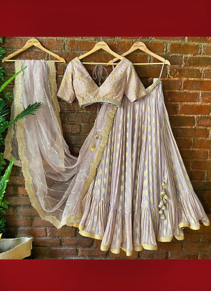 Mauve Ruffle Lehenga Set With V-neck Blouse Priti Sahni - Fabilicious Fashion