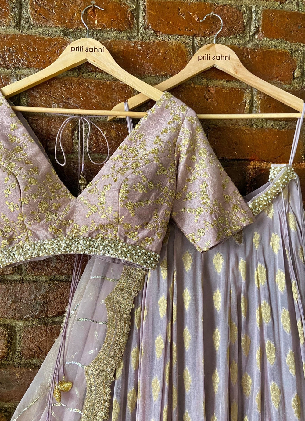 Mauve Ruffle Lehenga Set With V-neck Blouse Priti Sahni - Fabilicious Fashion