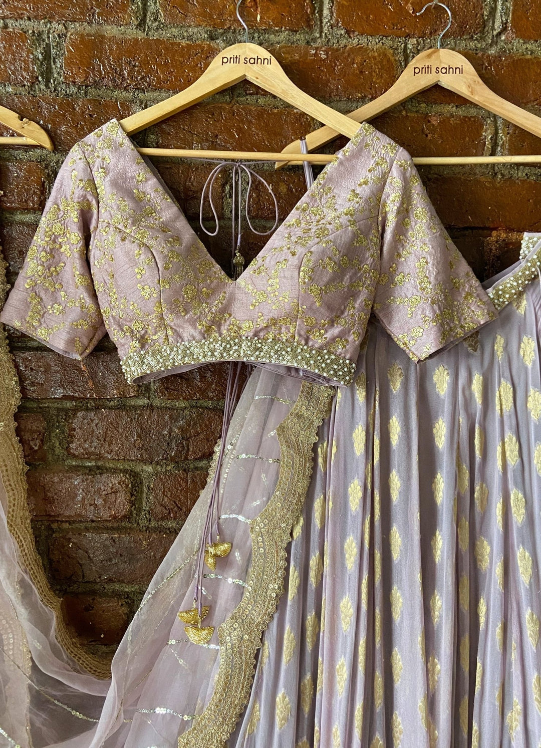 Mauve Ruffle Lehenga Set With V-neck Blouse Priti Sahni - Fabilicious Fashion