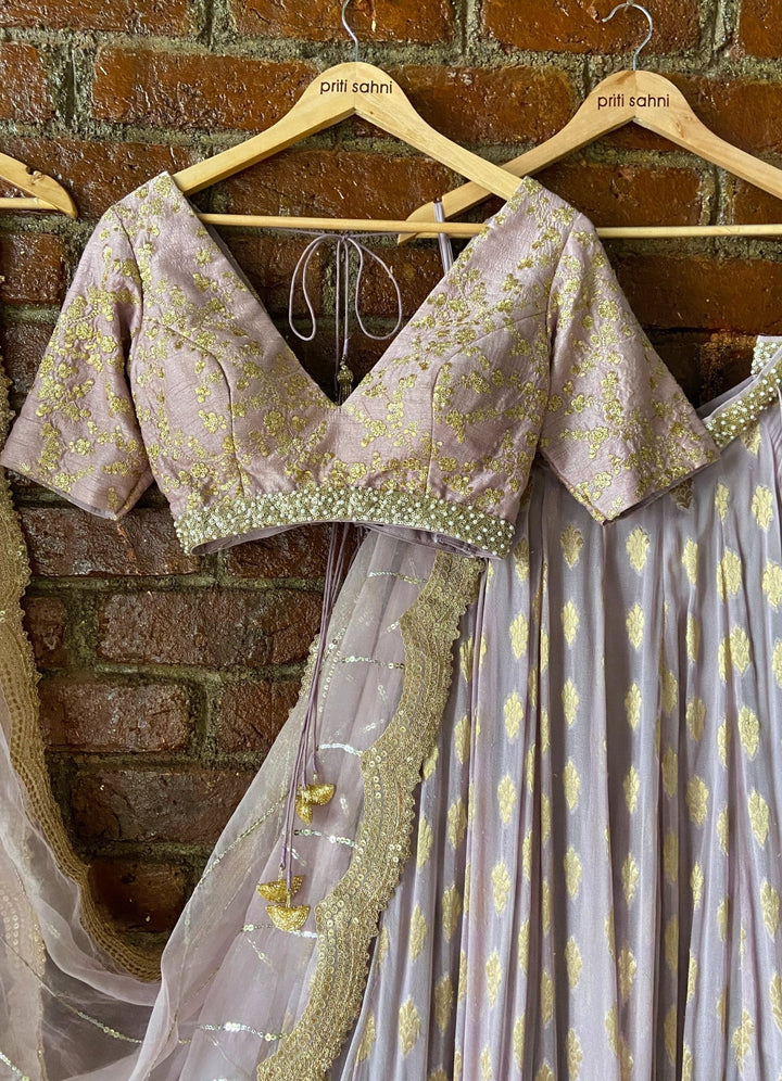 Mauve Ruffle Lehenga Set With V-neck Blouse Priti Sahni - Fabilicious Fashion