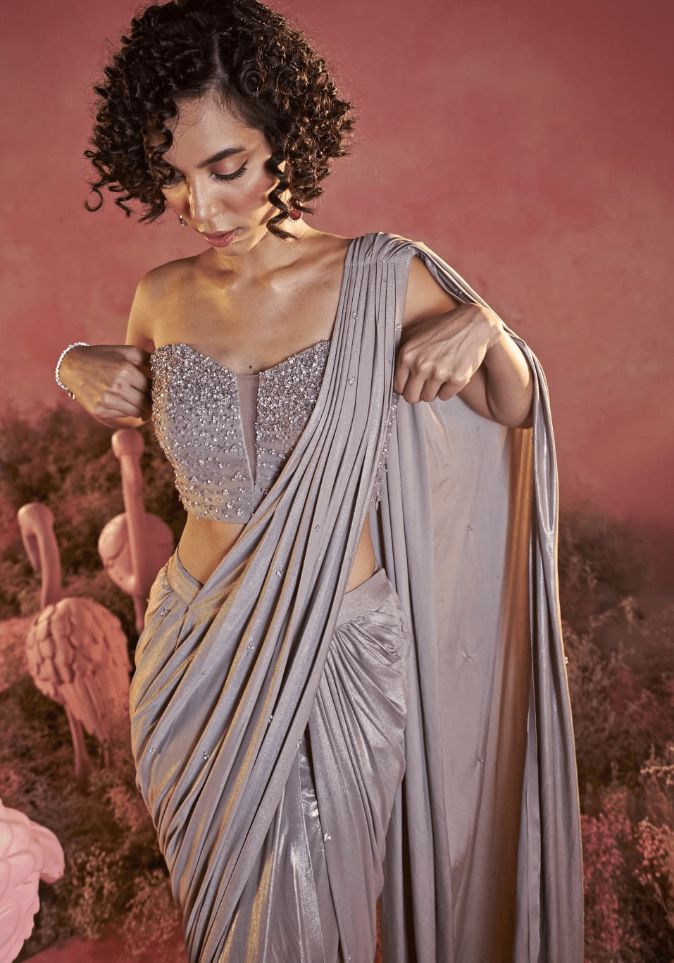 Metallic gold corset saree with pre-draped pleats for wedding guest styling