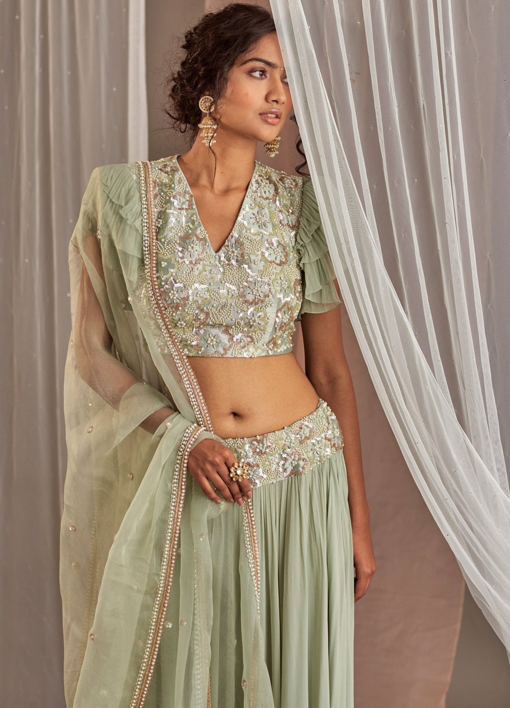 Muted Green Georgette Lehenga With Ruffle Sleeved Blouse Nidhika Shekhar - Fabilicious Fashion