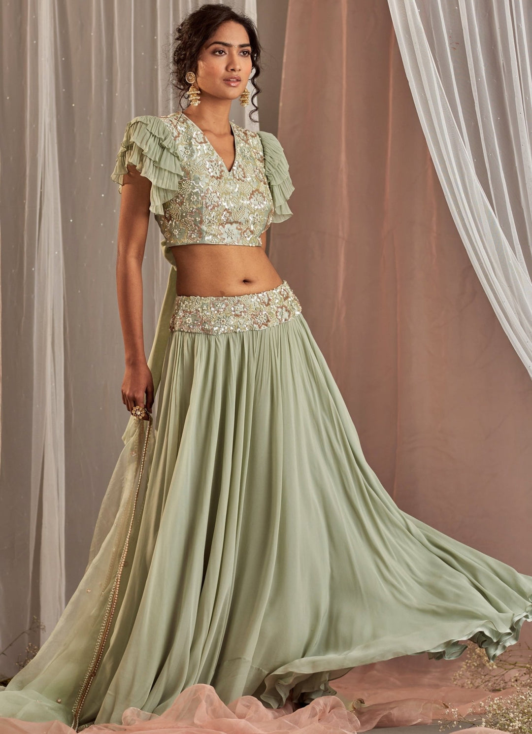 Muted Green Georgette Lehenga With Ruffle Sleeved Blouse Nidhika Shekhar - Fabilicious Fashion
