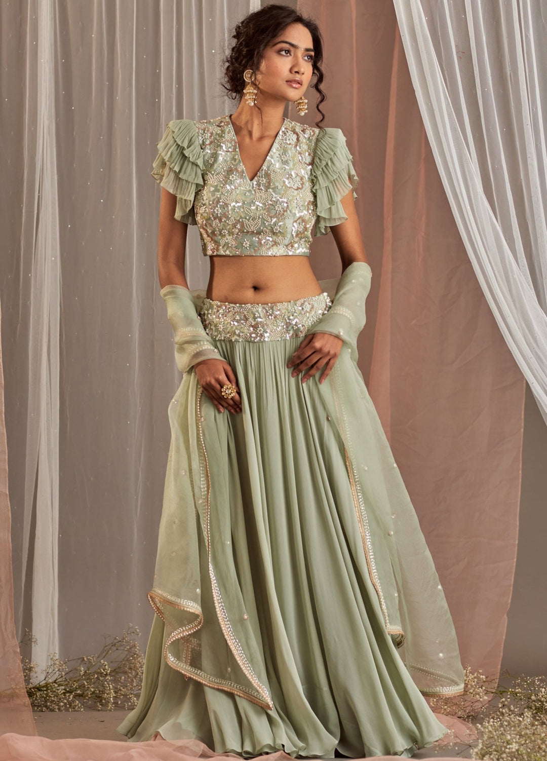 Muted Green Georgette Lehenga With Ruffle Sleeved Blouse Nidhika Shekhar - Fabilicious Fashion