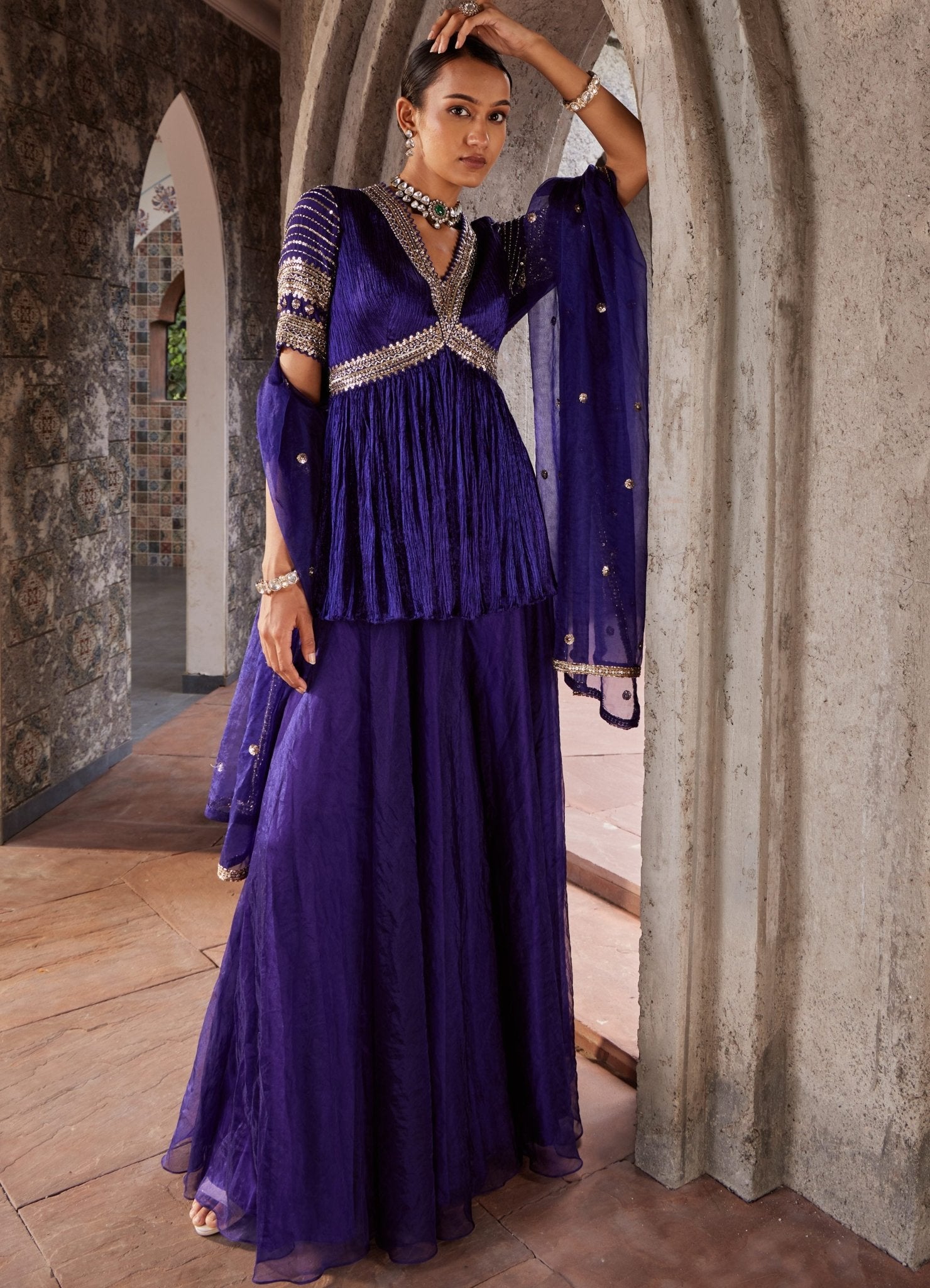 Purple embroidered short kurta sharara set for engagement UK by Nidhika Shekhar