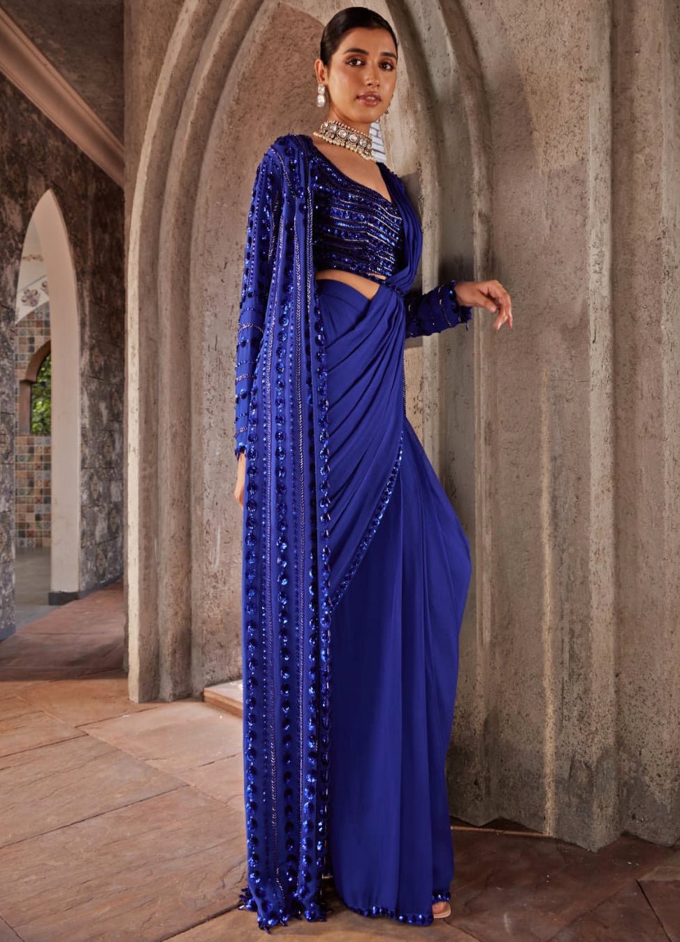 blue saree dress Midnight Blue Saree Gown With One-Shoulder Jacket Design by Onaya at Pernia's Pop Up Shop 2026