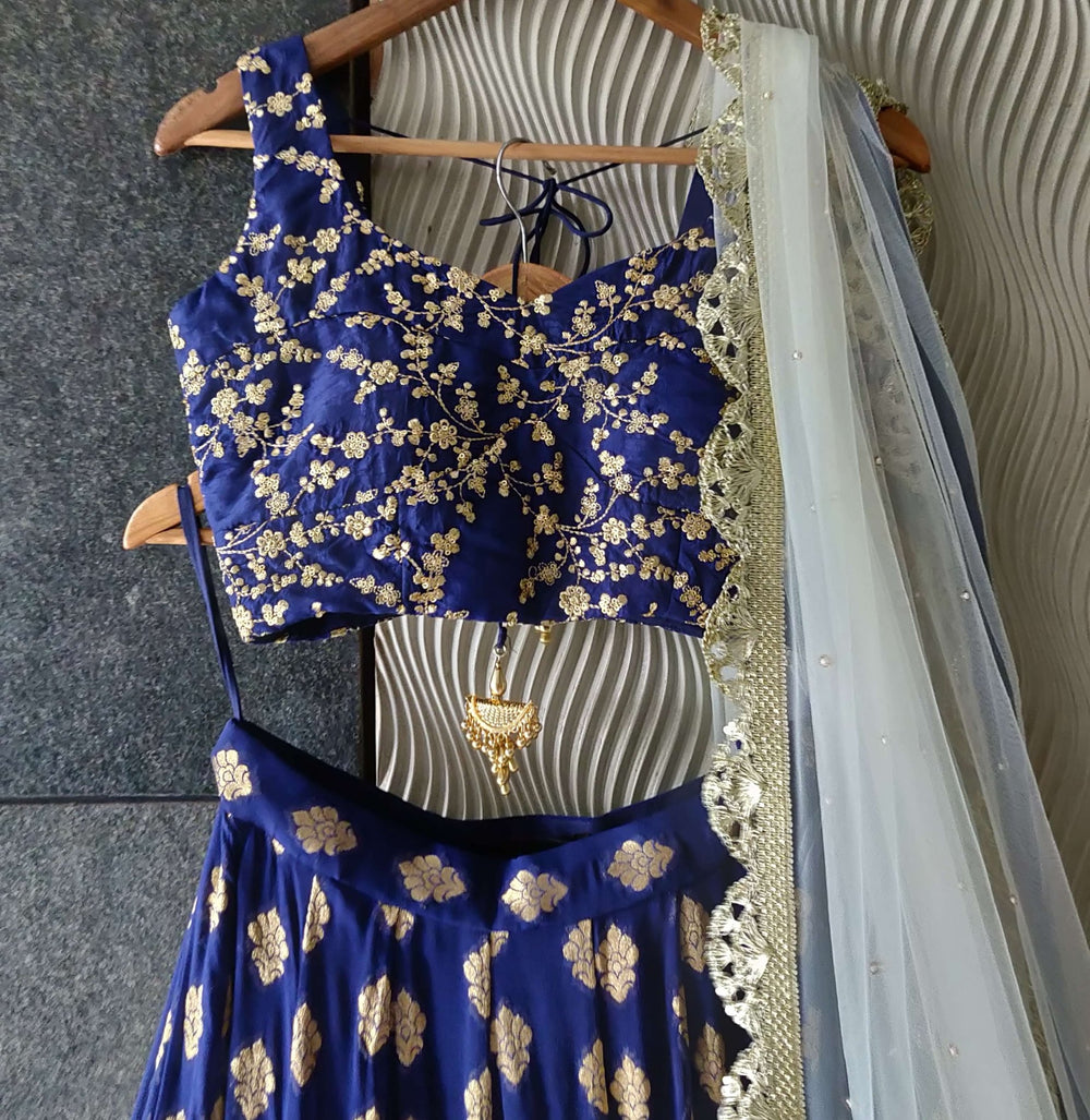 Royal Blue Ruffle Shimmer Lehenga Set with Blue Sequins Blouse and Off White Dupatta Priti Sahni - Fabilicious Fashion