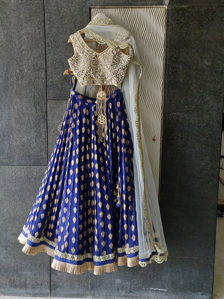 Royal Blue Ruffle Shimmer Lehenga Set with Mirror work Blouse and Off White Dupatta Priti Sahni - Fabilicious Fashion