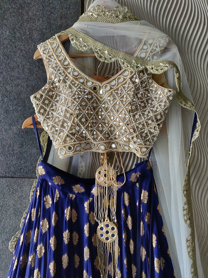 Royal Blue Ruffle Shimmer Lehenga Set with Mirror work Blouse and Off White Dupatta Priti Sahni - Fabilicious Fashion