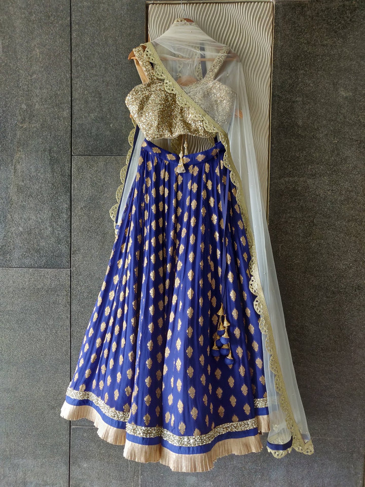 Royal Blue Ruffle Shimmer Lehenga Set with Sequins Blouse and Off White Dupatta Priti Sahni - Fabilicious Fashion