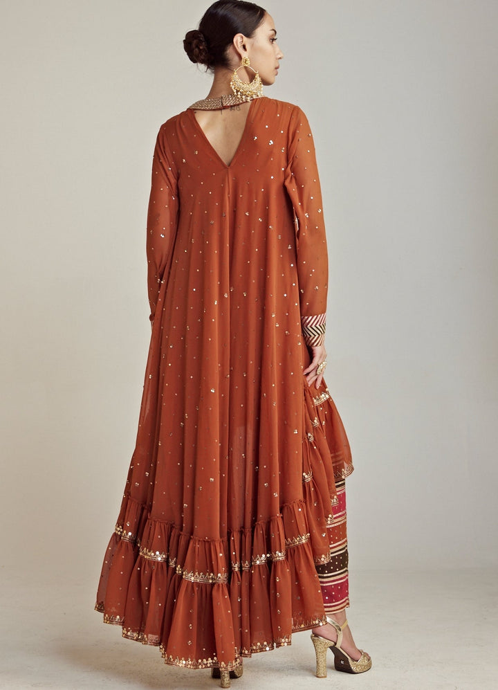 Rust Round Neck Asymmetrical Kurta Pant Set With Georgette Dupatta Vvani By Vani Vats - Fabilicious Fashion