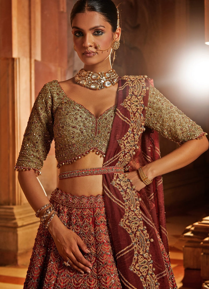 Rust Taffetta Lehenga With Olive, Maroon Tissue Dupatta And Belt Nitika Gujral - Fabilicious Fashion