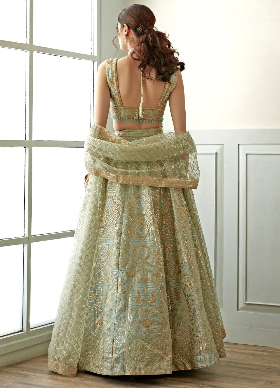 Soulful Sky Blue and Gold Sequenced Lehenga Set Studio Iris - Fabilicious Fashion
