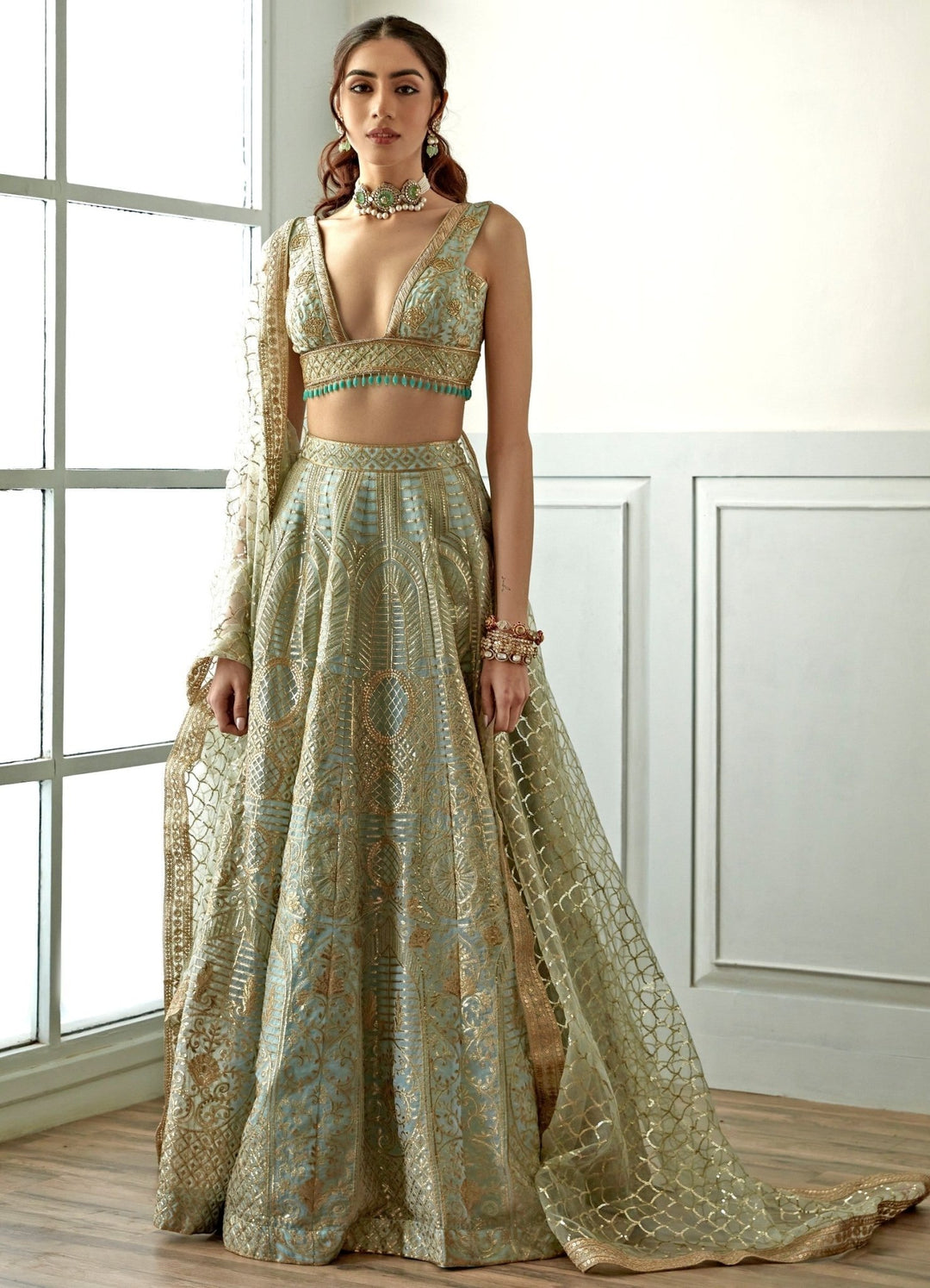 Soulful Sky Blue and Gold Sequenced Lehenga Set Studio Iris - Fabilicious Fashion