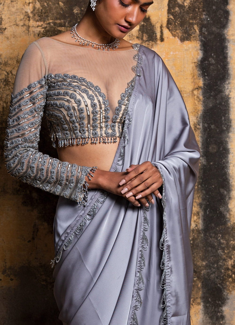 Steel Grey Drape Satin Saree With Nude Net Embellished Blouse Nitika Gujral - Fabilicious Fashion