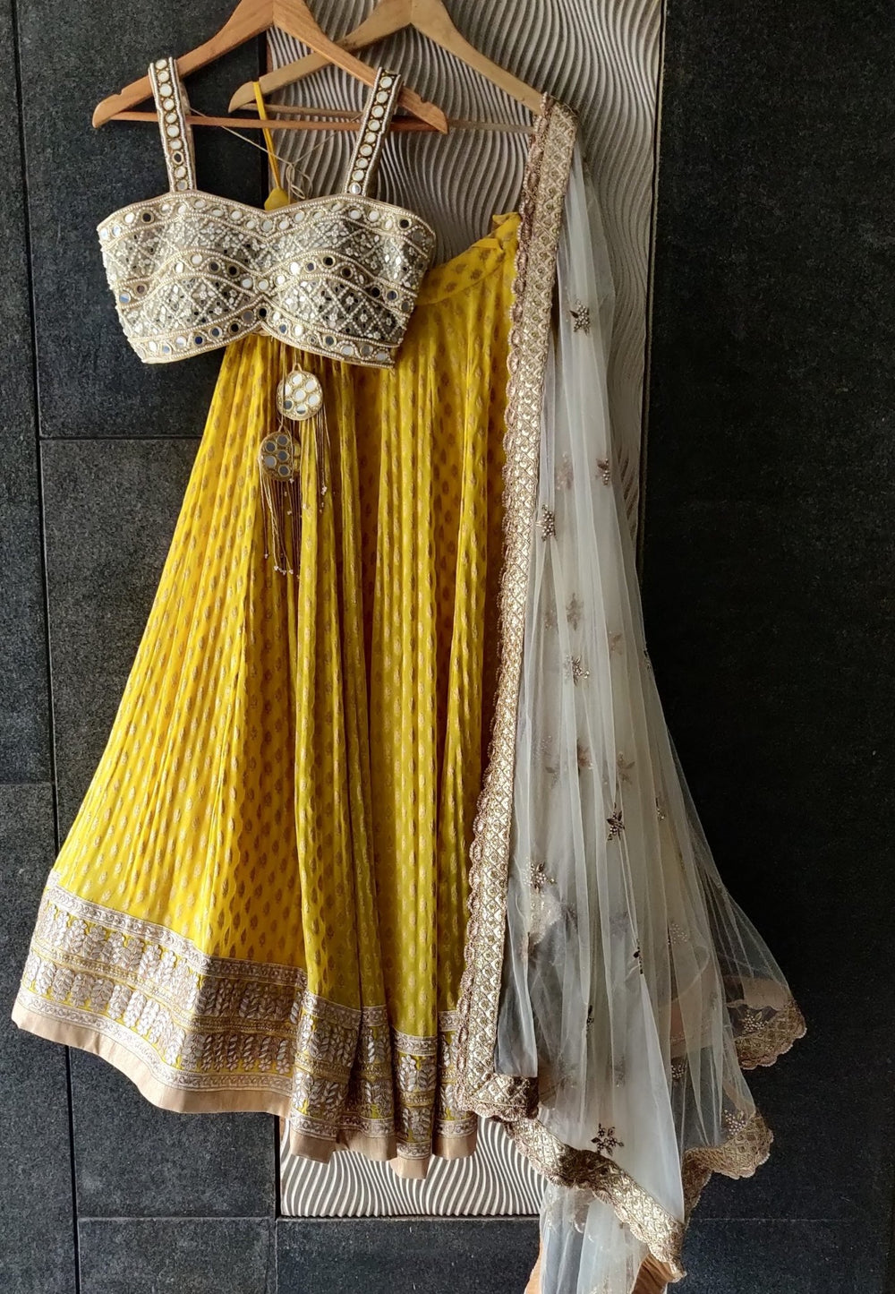 Sunshine Yellow Lehenga with Mirror work Bustier and Ivory Dupatta Priti Sahni - Fabilicious Fashion