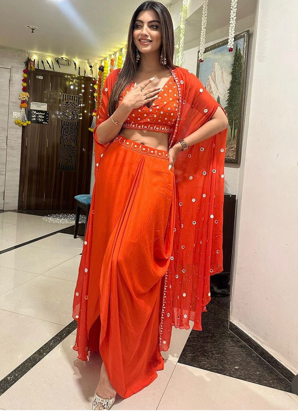 Orange dhoti Indo-Western set for mehendi wedding guest