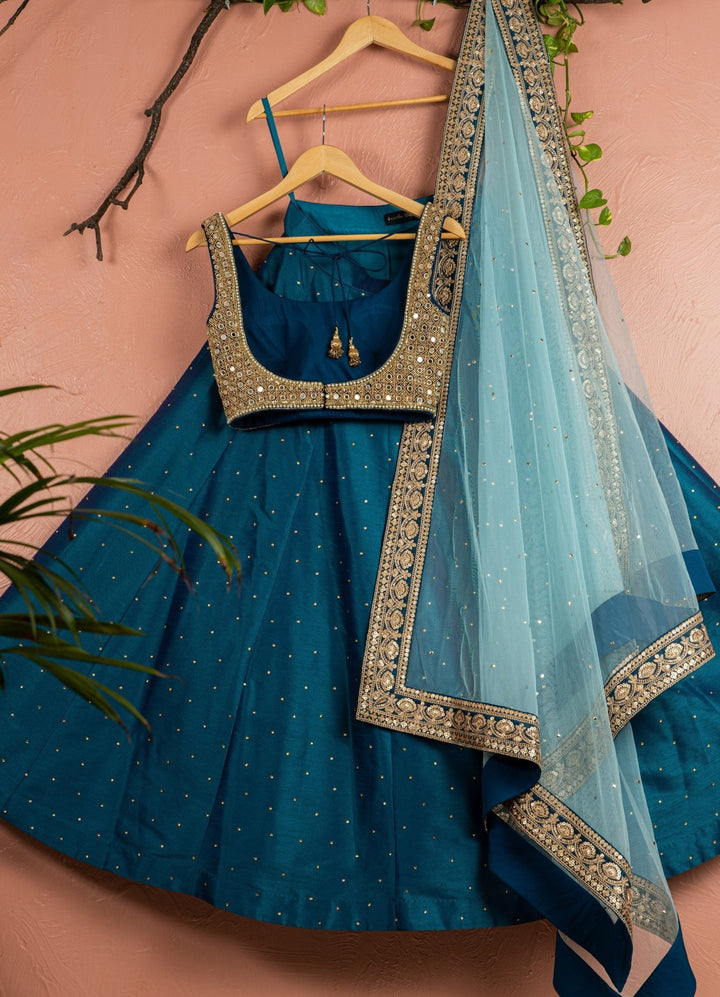 Teal Blue Stonework Silk Lehenga With Gold and Teal Mirror Blouse and Sky Blue Dupatta Anisha Shetty - Fabilicious Fashion
