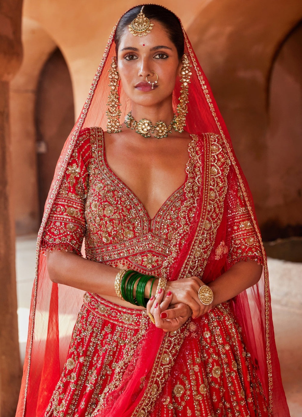 Vibrant Red Tasseled Bridal Silk Lehenga Set With Net Dupatta Nitika Gujral - Fabilicious Fashion