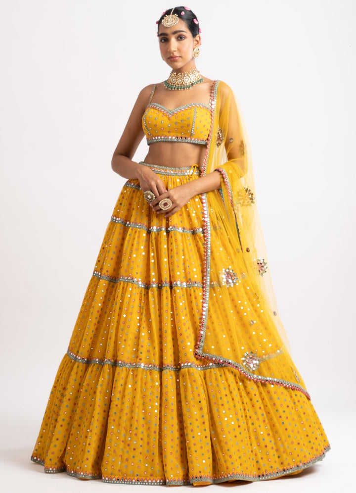 Yellow Strappy Blouse and Tiered Lehenga Set Vvani by Vani Vats - Fabilicious Fashion