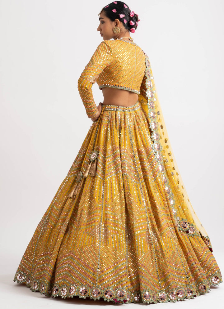 Yellow V Neck Heavy Multi Color Lehenga Set Vvani by Vani Vats - Fabilicious Fashion